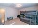 bedroom featuring a bunk bed, a dark gray chair, and comfortable carpeted floors at 5413 Austin Rd # 4, Monroe, NC 28112