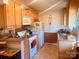 Efficient kitchen with light cabinets and granite countertops at 565 Wakefield Dr, Charlotte, NC 28209