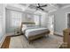 Tranquil bedroom featuring a decorative ceiling and a door leading to the bathroom at 643 Mcalway Rd, Charlotte, NC 28211