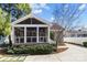 View of screened porch addition with steps and nearby driveway at 643 Mcalway Rd, Charlotte, NC 28211