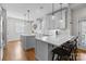 Modern kitchen with white cabinets, quartz countertops, and stainless-steel appliances at 643 Mcalway Rd, Charlotte, NC 28211