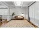 Living room with hardwood floors, coffered ceiling, a comfortable leather sofa and light and bright finishes at 643 Mcalway Rd, Charlotte, NC 28211