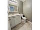 Bathroom boasts double vanity, white cabinets and updated fixtures at 7025 Spring Morning Ln, Charlotte, NC 28227