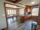 Dining room area featuring hardwood floors, natural light, and comfortable seating at 925 Belmorrow Dr, Charlotte, NC 28214