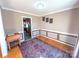 Inviting dining room featuring hardwood floors, neutral walls, and elegant wainscoting at 925 Belmorrow Dr, Charlotte, NC 28214