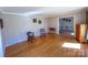 Cozy living room with hardwood floors, rocking chairs and neutral color scheme at 925 Belmorrow Dr, Charlotte, NC 28214