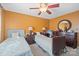 Cozy bedroom features two beds with matching nightstands and a ceiling fan at 102 Brandywine Ne Dr # Q4, Conover, NC 28613