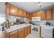 Bright kitchen featuring an open-concept design and white countertop space at 102 Brandywine Ne Dr # Q4, Conover, NC 28613