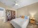 Bedroom with shelving and a neutral color palette at 108 Avaclaire Way, Indian Trail, NC 28079