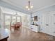 Breakfast nook with many windows offering natural light and a coffee bar for convenience at 108 Avaclaire Way, Indian Trail, NC 28079