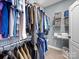 Walk-in closet with wire shelving, carpet flooring, and ample storage space at 108 Avaclaire Way, Indian Trail, NC 28079