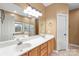 Primary bathroom features dual vanities, large mirror, soaking tub, and separate glass shower at 111 Harris Farm Rd, Mooresville, NC 28115