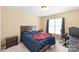 Bedroom with warm colors, great natural light, and a window at 111 Harris Farm Rd, Mooresville, NC 28115
