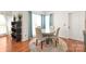 Cozy breakfast nook with a round table, cushioned chairs, and natural light from windows at 111 Harris Farm Rd, Mooresville, NC 28115