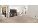 Spacious loft area with neutral carpet perfect for a TV room, office, or additional living space at 111 Harris Farm Rd, Mooresville, NC 28115
