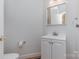 Bathroom featuring a single sink vanity with white cabinetry and chrome fixtures at 1120 Millwright Ln, Matthews, NC 28104