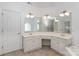 Open bathroom layout with dual sinks, vanity, and large mirrors, plus separate shower and tub at 1120 Millwright Ln, Matthews, NC 28104