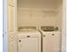 Well-equipped laundry room with a Maytag washer and dryer set and shelving for storage at 1120 Millwright Ln, Matthews, NC 28104