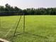 A large soccer field with green grass and soccer goals for recreational activities and community engagement at 1120 Millwright Ln, Matthews, NC 28104