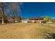 Expansive backyard with a well-maintained lawn and mature trees at 1139 Suttle Rd, Lancaster, SC 29720