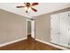 Bedroom featuring hardwood floors, a ceiling fan, closet and neutral walls at 1139 Suttle Rd, Lancaster, SC 29720