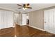 Comfortable bedroom featuring hardwood floors, a ceiling fan and a spacious closet at 1139 Suttle Rd, Lancaster, SC 29720