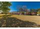 Charming single-story brick home with a well-manicured lawn and mature trees on a sunny day at 1139 Suttle Rd, Lancaster, SC 29720