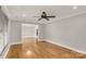 Bright living room featuring hardwood floors, crown molding, and neutral paint at 1139 Suttle Rd, Lancaster, SC 29720