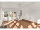 Enclosed sunroom featuring tongue and groove ceiling and walls, with a staircase at 1139 Suttle Rd, Lancaster, SC 29720