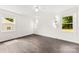 Bright bedroom with hardwood floors and large windows offering scenic views at 1316 Fox Run Dr, Charlotte, NC 28212