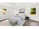 Comfortable main bedroom featuring lots of light and neutral decor at 1316 Fox Run Dr, Charlotte, NC 28212