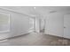 Neutral bedroom with carpeted floors, a large window and a large closet at 1439 Mammoth Rd, Hickory, NC 28602