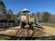 Community playground with slides and climbing structures, providing a fun and safe recreational area for children at 151 E Morehouse Ave, Mooresville, NC 28117