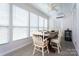 Bright dining area with windows, a ceiling fan, and space for entertaining at 1621 Keeling Pl, Charlotte, NC 28210