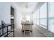 Bright dining area with lots of natural light, a ceiling fan, and room for seating at 1621 Keeling Pl, Charlotte, NC 28210