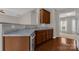 Functional kitchen showcasing laminate countertops, wooden cabinets, and hardwood floors at 187 Snead Rd, Fort Mill, SC 29715