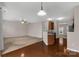 An open-concept living room with hard wood flooring adjacent to the updated kitchen at 187 Snead Rd, Fort Mill, SC 29715