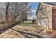 Spacious backyard with a fence, driveway and a lake view at 2013 Barkley Cir, Monroe, NC 28112