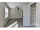 Cozy bedroom boasts a ceiling fan, hardwood-style flooring, and closet at 2013 Barkley Cir, Monroe, NC 28112