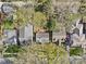 This aerial view showcases homes with lush landscaping, mature trees, and a well-maintained neighborhood street at 2309 Shenandoah Ave, Charlotte, NC 28205