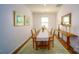 Cozy dining room featuring a wooden table and green accents at 3021 Sassafras Trl, Gastonia, NC 28056