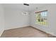 Bright dining room with modern light fixture and large window at 3919 Chatterleigh Dr, Monroe, NC 28110