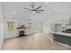 Spacious living room area with a stone fireplace and bright windows at 3919 Chatterleigh Dr, Monroe, NC 28110