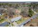 Aerial view showcases the property's location and surrounding neighborhood with mature trees and ample yard space at 403 E 27Th St, Kannapolis, NC 28083