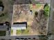 Real estate aerial view outlines the property's boundaries and features of the lot and neighborhood at 403 E 27Th St, Kannapolis, NC 28083