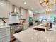 Bright kitchen showcasing granite countertops, stainless steel appliances, and sleek cabinetry at 4216 Maureen Dr, Charlotte, NC 28205