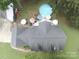 Overhead shot showing roof and backyard area with above ground pool surrounded by lush landscaping at 4436 Roberta Rd, Concord, NC 28027