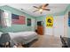 Bedroom featuring light green walls, decor, ceiling fan, and natural light at 4436 Roberta Rd, Concord, NC 28027