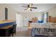 Comfortable bedroom with ceiling fan, natural light, and ample closet space at 4436 Roberta Rd, Concord, NC 28027