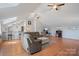 Open concept living room featuring vaulted ceilings, bar seating, and plenty of natural light at 4436 Roberta Rd, Concord, NC 28027